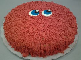 tarta muñeco rojo